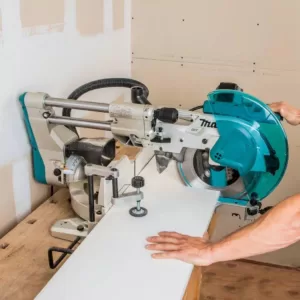 Makita 12 in. Dual-Bevel Sliding Compound Miter Saw with Laser with bonus Compact Folding Miter Saw Stand